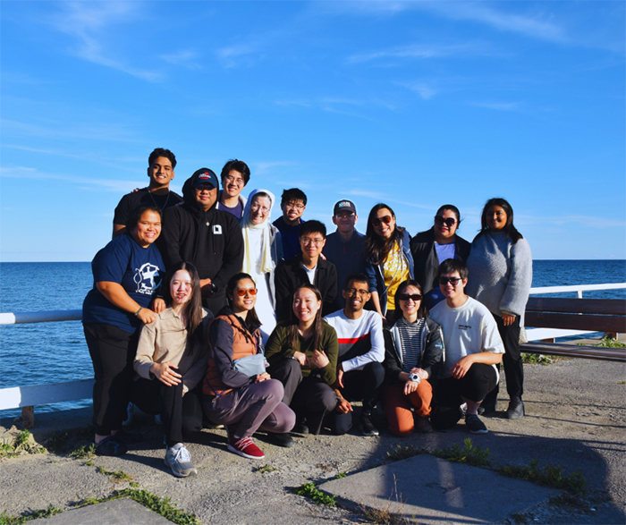 DIA community group photo at the lakeshore